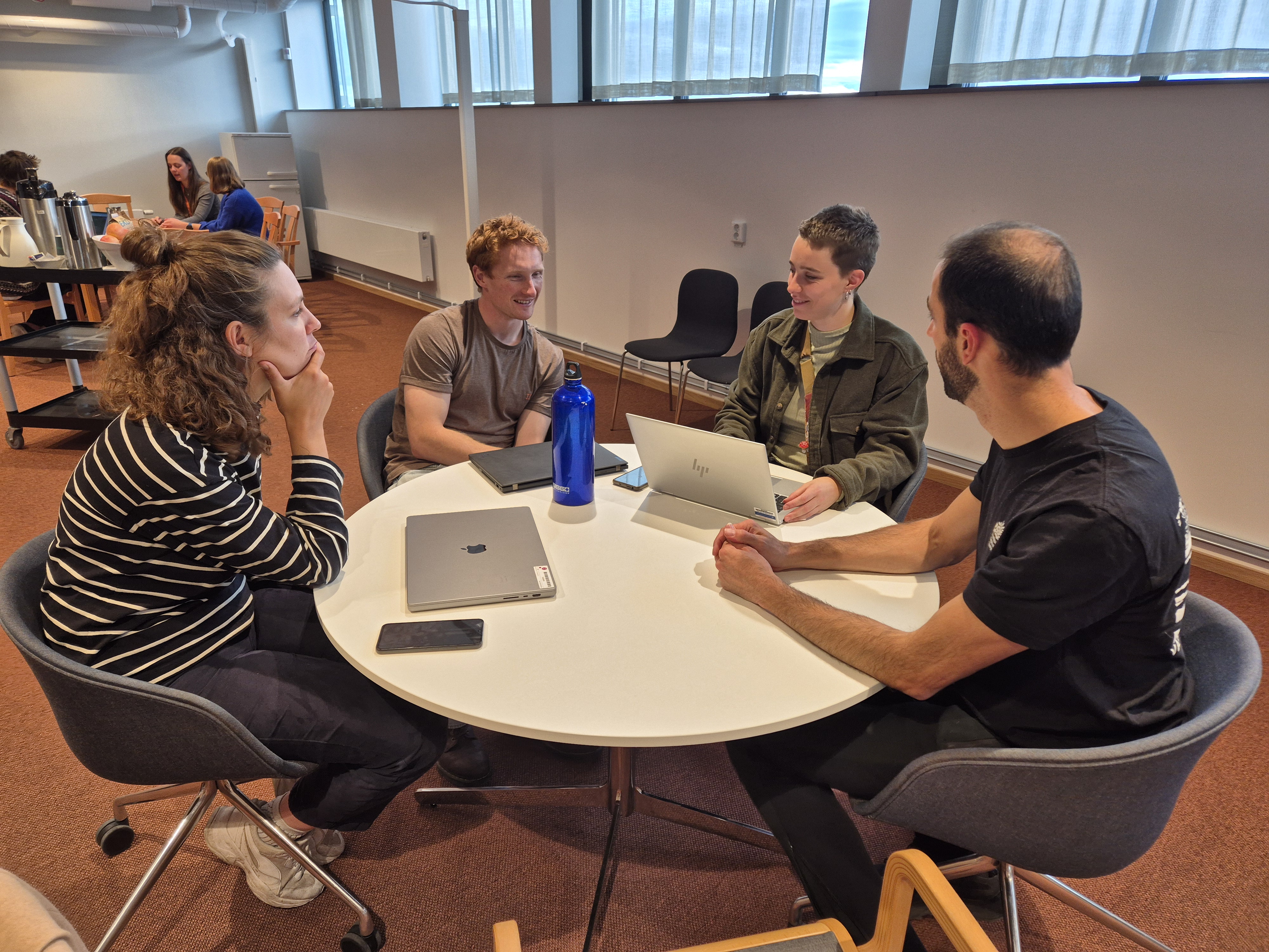 Breakout discussion group talking at a table