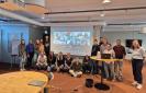 The group of in-person and online participants