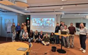 The group of in-person and online participants